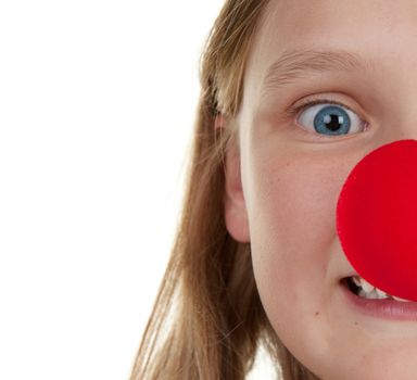 young girl with a red nose