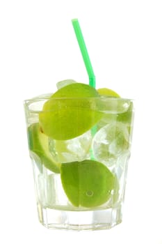 green glass of lemonade with lime or lemon