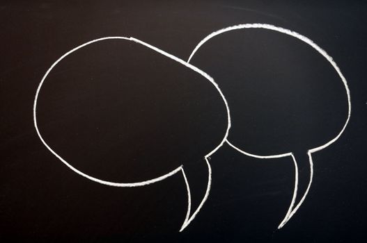 chalkboard with speech bubble and copyspace for text message