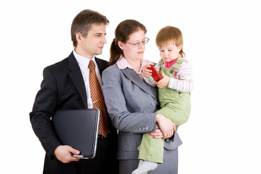 father and mother dressed for business with child