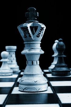 chess pieces showing power competition conflict and strategy in business