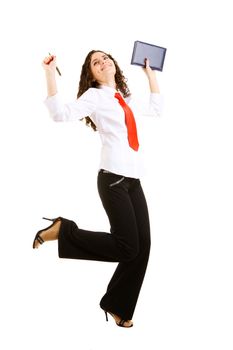 smiling businesswoman jumps with a pan and a book