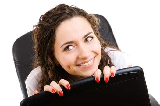 business woman in armchair with notebook