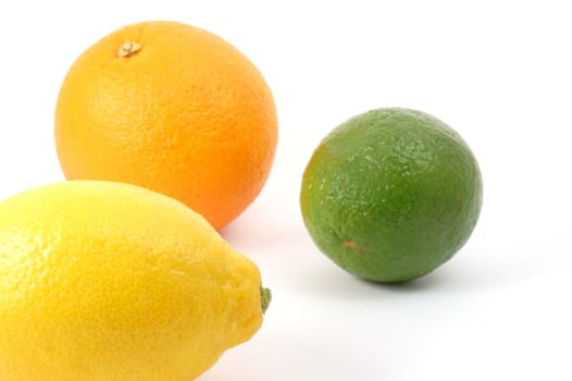 fresh lemon , orange , and citron fruits isolated on a white background