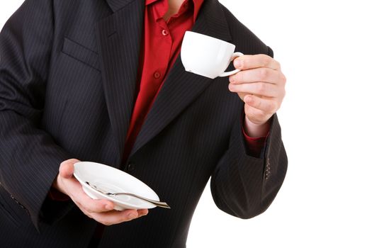 white coffee cup in the hand of the man