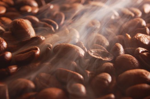 roasting coffee beans with steam and smoke