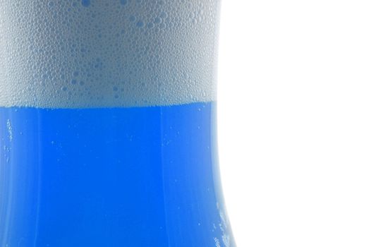 colored drink with foam isolated on white background