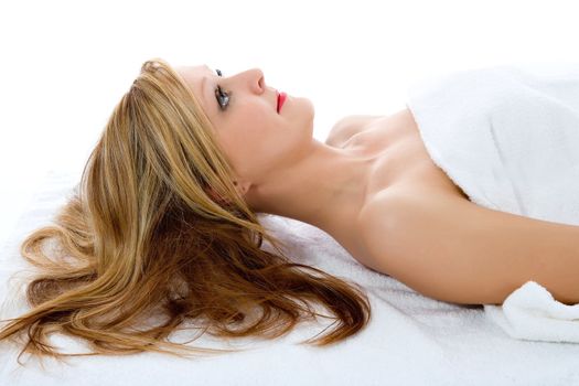 Attractive woman getting spa treatment on white