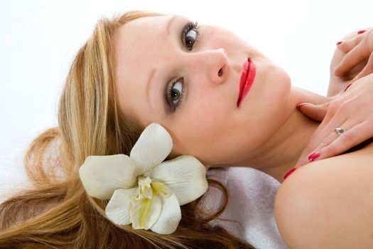 Attractive woman getting spa treatment on white