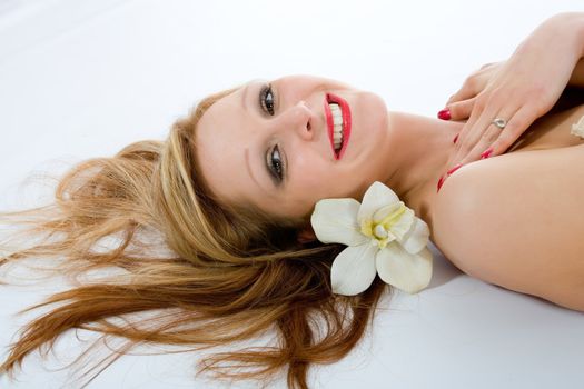 Attractive woman getting spa treatment on white