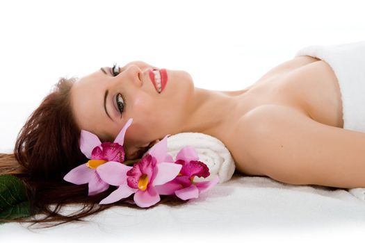 Attractive woman getting spa treatment on white