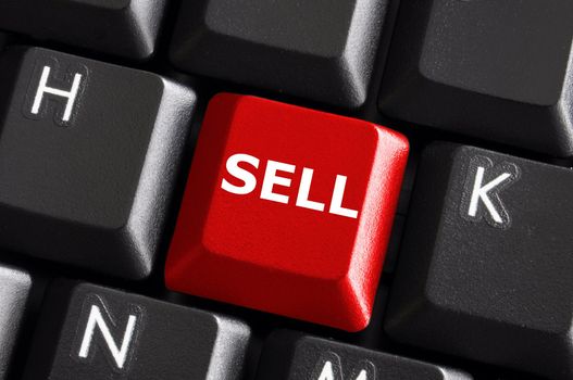 sell written on keyboard showing business or finance concept