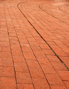 background of a curve red orange brick wall