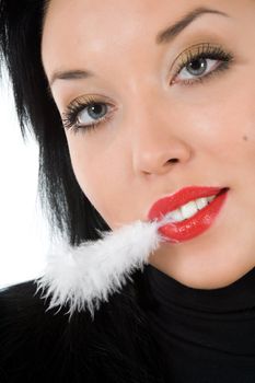 portrait of the brunette with plume on white