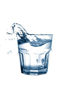 cold splashing water drink with ice cube