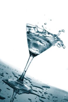 glass of water as a summer drink with ice cube