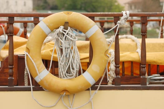 yellow life-belt on ship deck