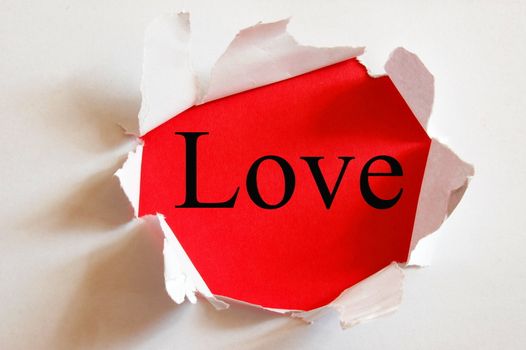 love on red background in a hole