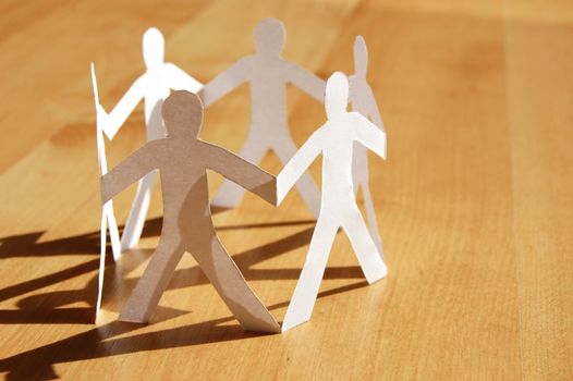 paper man showing concept for business teamwork and love