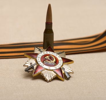 Bullet, the Order of the Patriotic War and the Ribbon of Saint George.