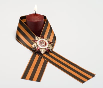 Burning candles Ribbon of Saint George and the Order of the Patriotic War.