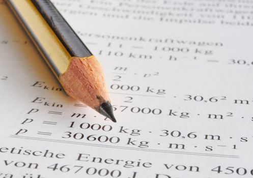 physics science at school with pencil book and formula