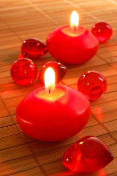 red spa candle and red bath decoration