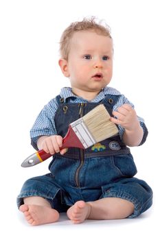 Beautiful baby with paint brush on white