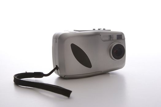 small gray point and shoot camera