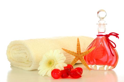 bottle with massage oil isolated on white background