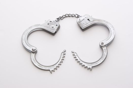 Open metal chained handcuffs