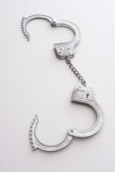 Open metal chained handcuffs