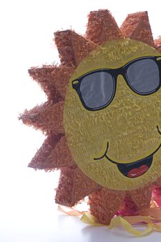 Back lite pinata, the pinata is a sun wearing sunglasses