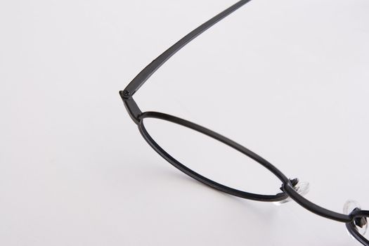close up on the left side of a pair of glasses without lenses