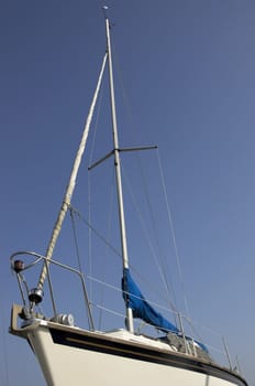 Aview of a sailing boat looking up at the mast