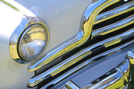 Close-up of a white vintage car.