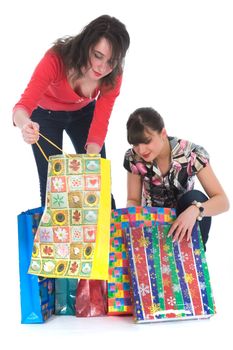 expressive girls  on white background  shopping