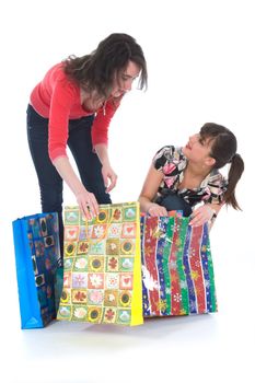 expressive girls  on white background  shopping