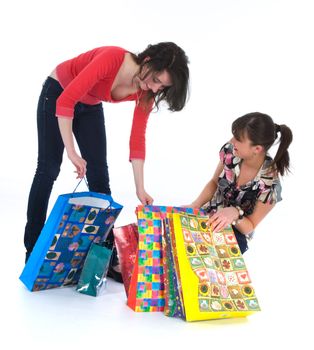 expressive girls  on white background  shopping