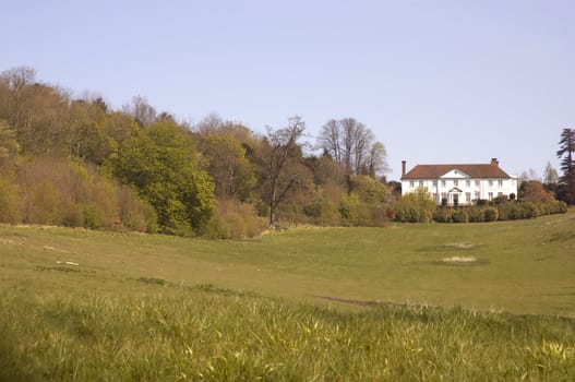 A large house on the top of a hill