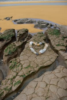 a love heart arranged with stones on the west coast of ireland near ballybunion