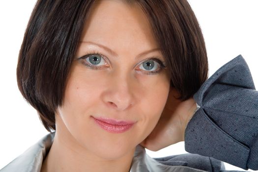 portrait of the brunette with blue eye on  white background