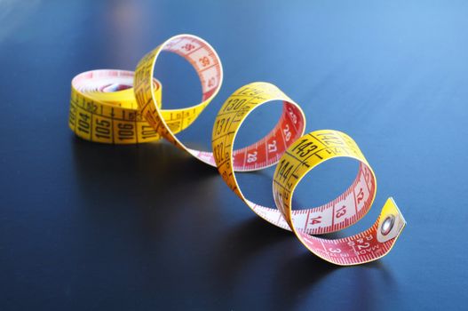 measuring tape showing diet or taylor concept
