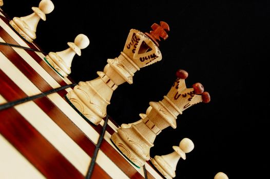 chess pieces showing concept of conflict power and success