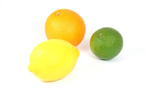 fresh lemon , orange , and citron fruits isolated on a white background