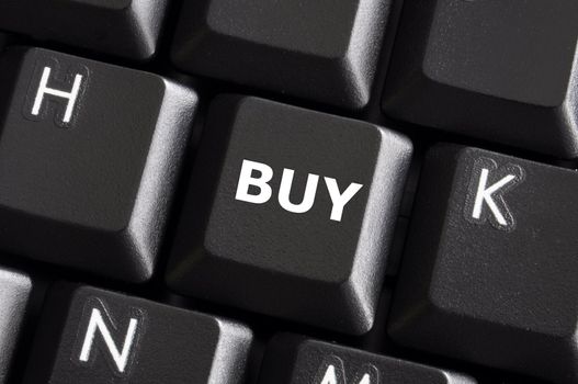 buy button on computer keyboard showing business concept