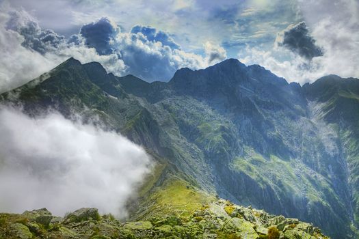Impressive landscape in Fagaras Mountains,Romania. In the distance you can see the Negoiu summit, which is the second highest mountain top (2635 m) in this mountain range.