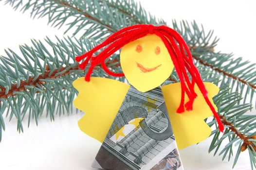 Angel made of money isolated on white background