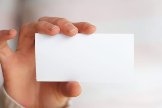 hand and blank paper with copyspace for your text message