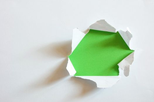 green hole with copyspace in empty sheet paper